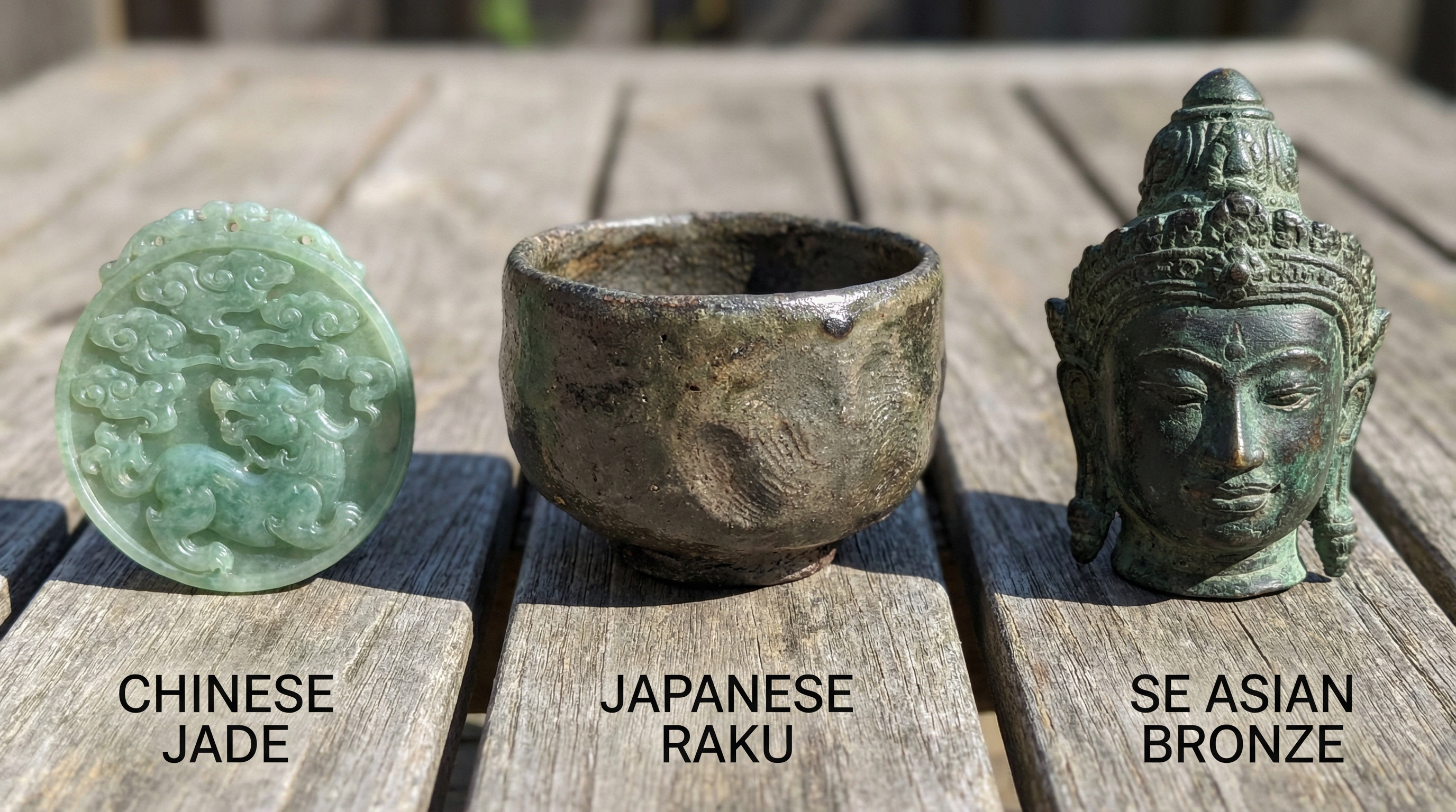 Close-up comparison showing Chinese jade carving, Japanese ceramic tea bowl, and Southeast Asian bronze sculpture highlighting different materials and techniques