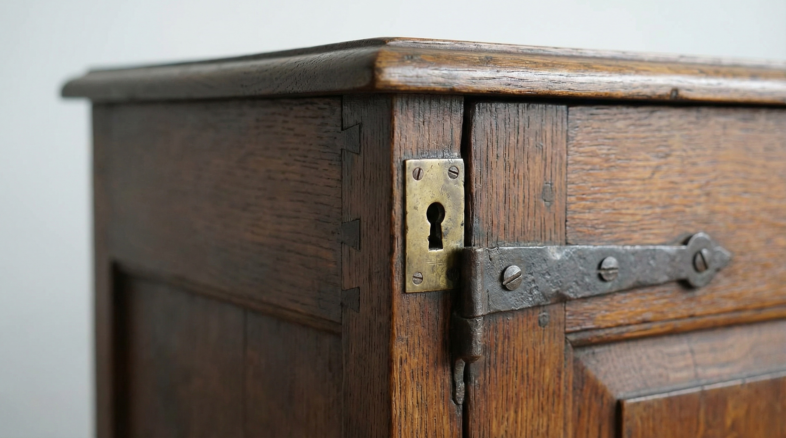 Close up details of antique furniture joinery, hardware, and materials