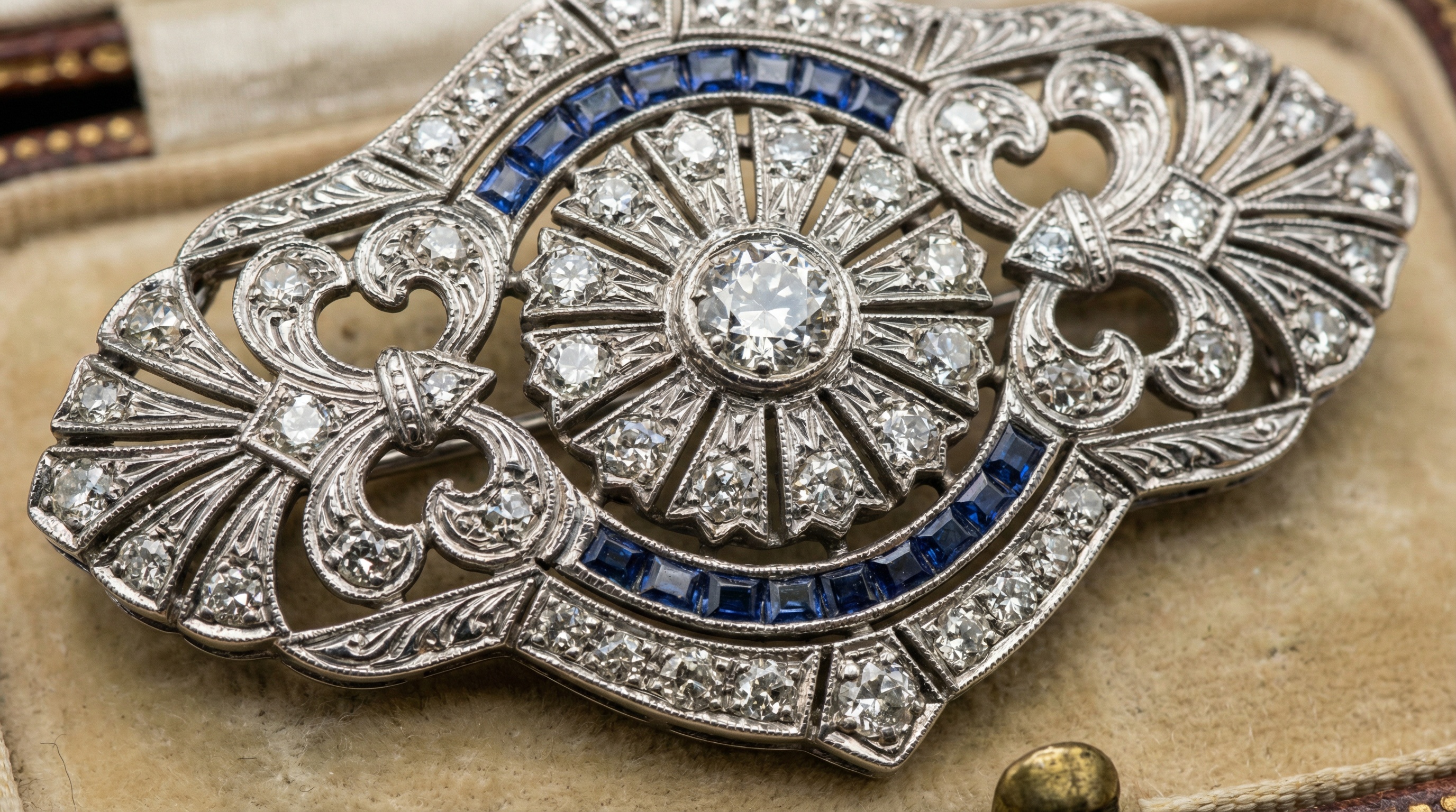 Detailed close-up of art deco diamond brooch showing intricate platinum work and period craftsmanship